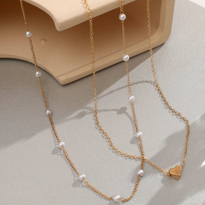 LAYERED HEART & PEARL JEWELRY SET